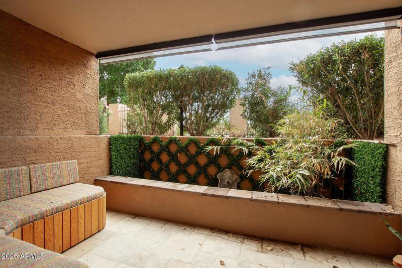 Patio has built in furniture w/storage