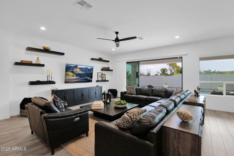 Great room w/sliding doors to pool area