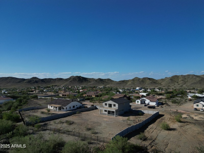 Back property with block wall and fencin