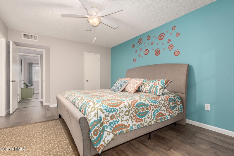 Master Suite with Wood Laminate Flooring