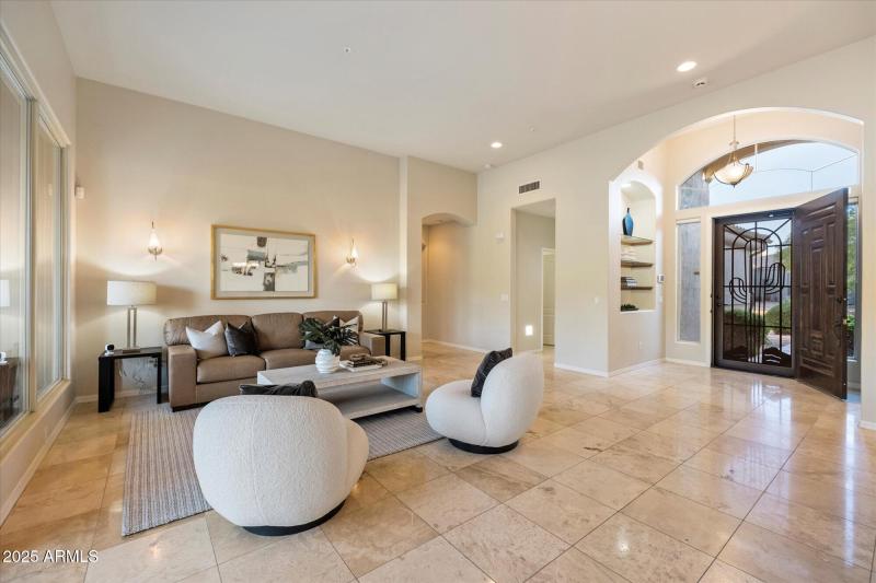 LIVING ROOM TO ENTRANCE FOYER