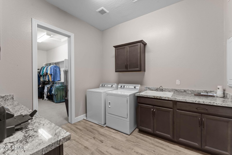 Laundry room with sink