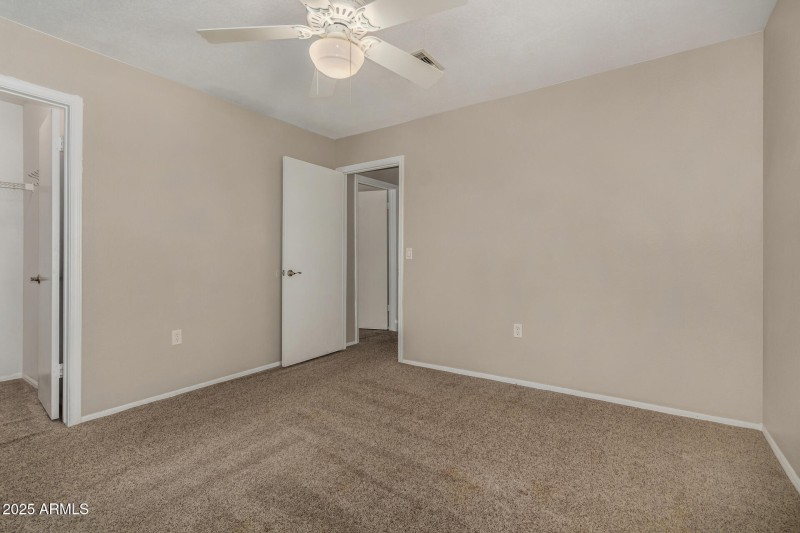 bedroom 3 with walk in closet