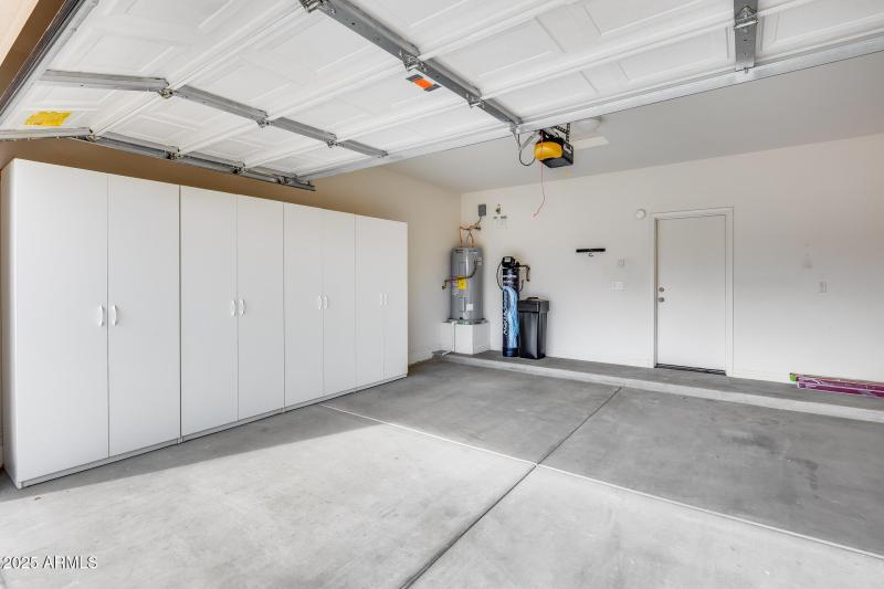 2 Car Garage with Storage Cabinets