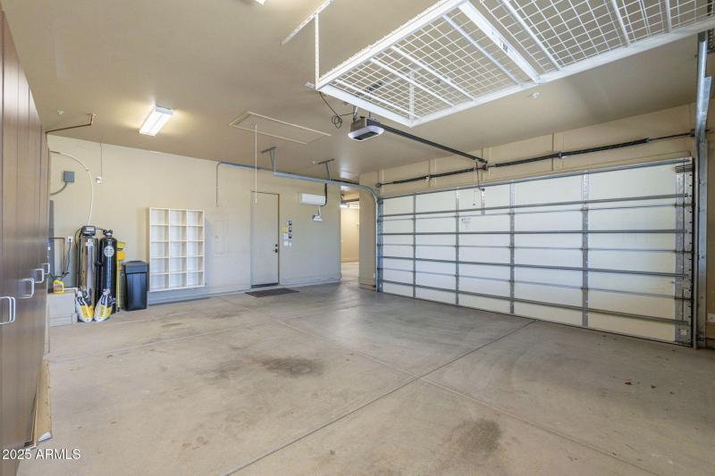 Garage with storage racks, built in cabi