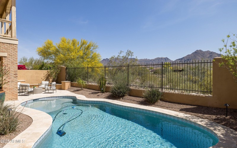 Sparkling Pool with Desert Views