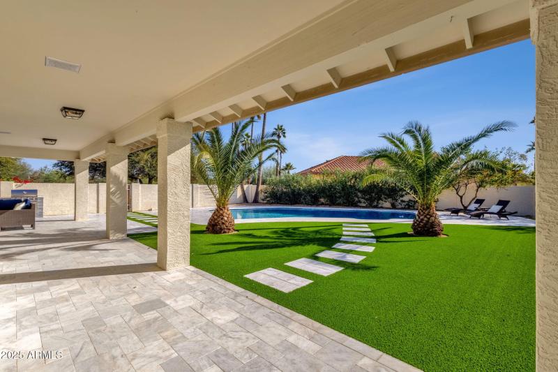 Patio with steps to pool
