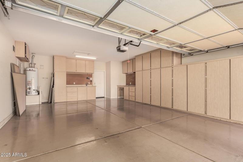 Garage with Cabinets and Work bench!