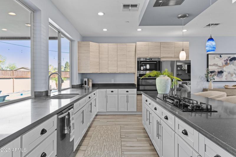 Kitchen with backyard views