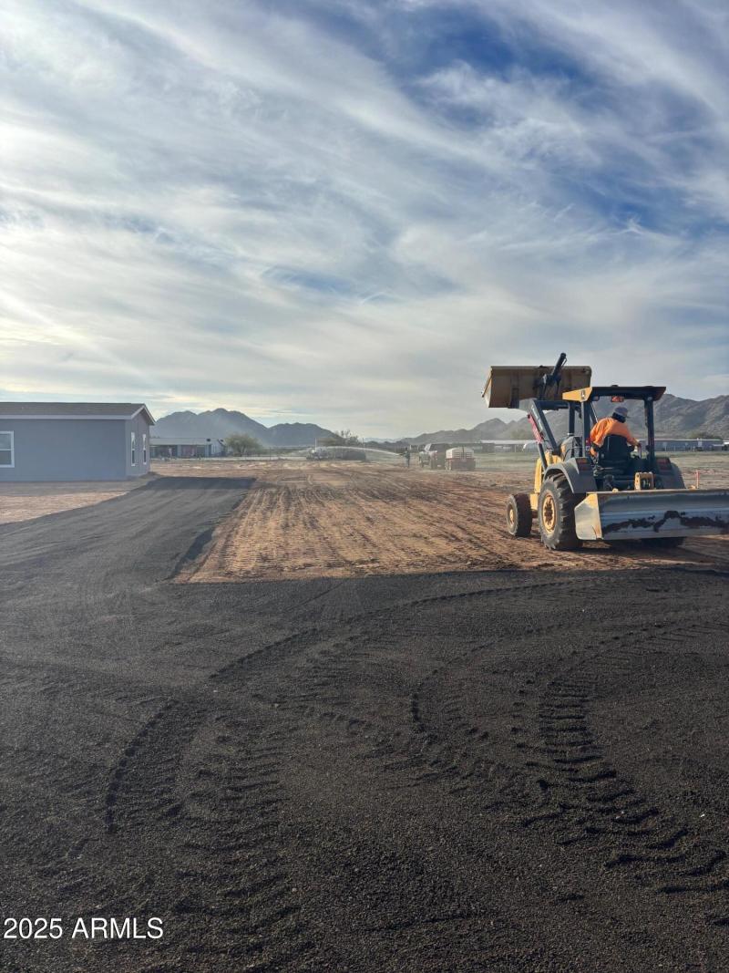 Driveway and grade the land