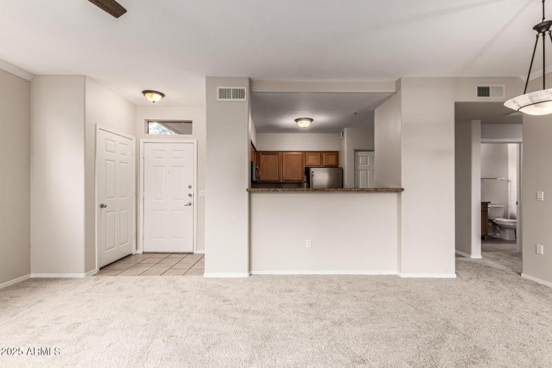 View to Front Door and Kitchen