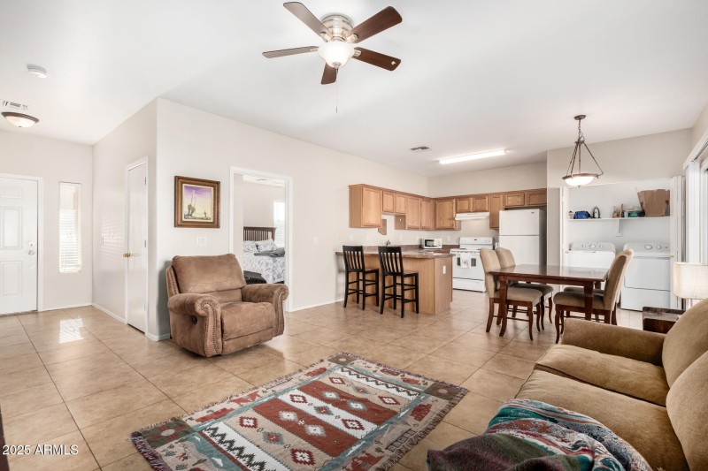 LIVING SPACE OPEN TO KITCHEN AND DINING