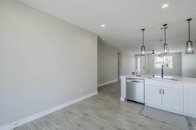 White Shaker Cabinets w/ Crown Molding
