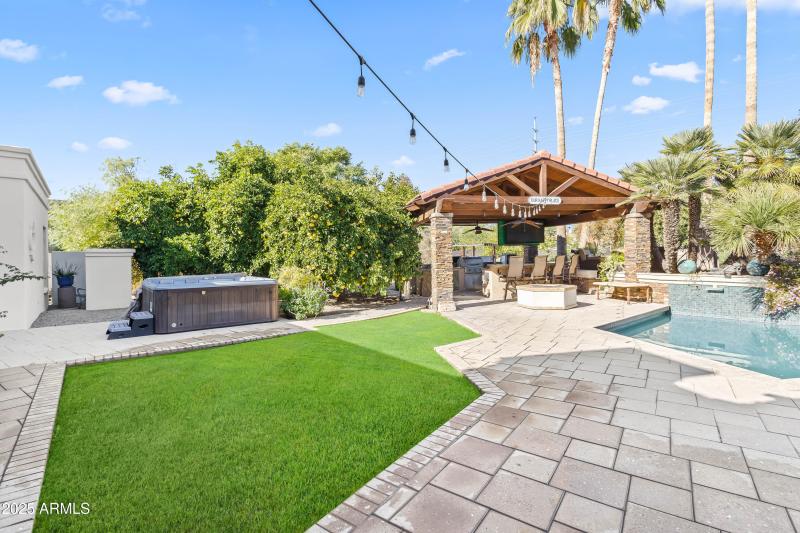 ABOVE GROUND SPA + OUTDOOR KITCHEN VIEW