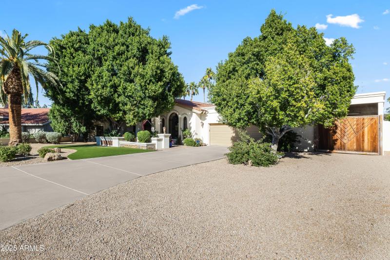 FRONT VIEW + RV GATE/ CARPORT