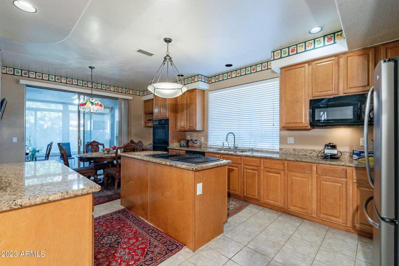 Kitchen toward enclosed patio