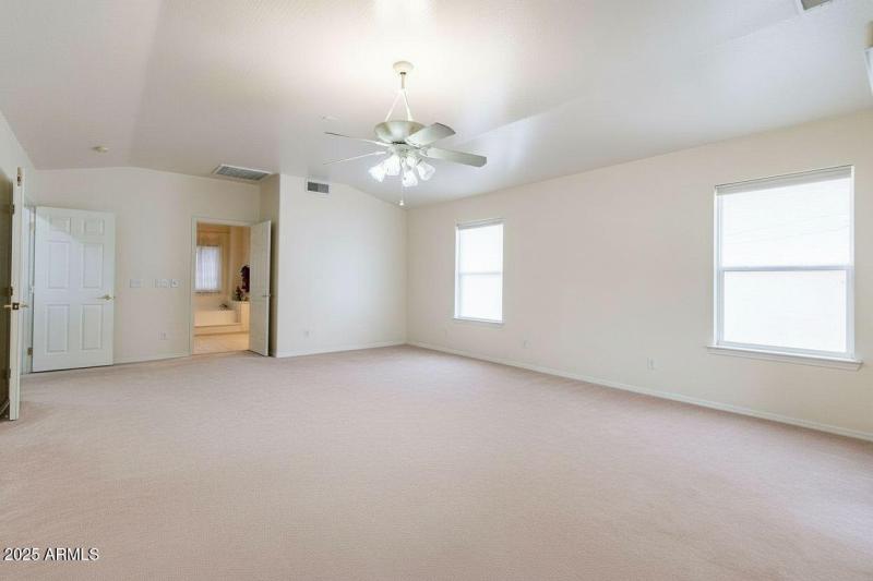 Primary bedroom and bathroom