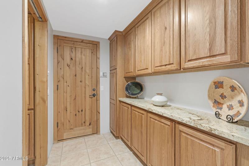 Hallway to Garage with Storage