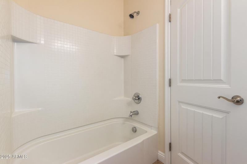 Downstairs en suite bath to bedroom 4