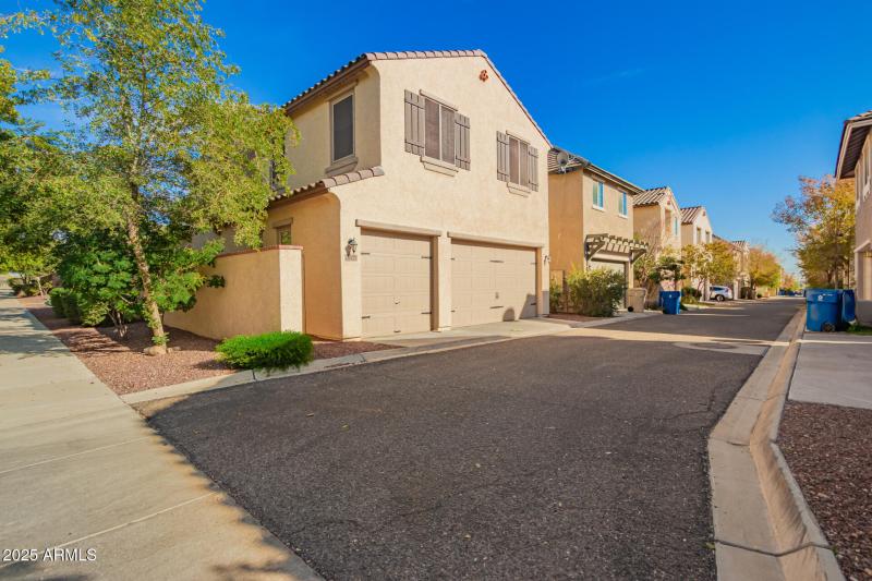 Back of home - 3 car garage