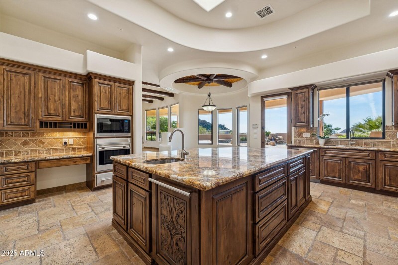 Kitchen Looks out at Patio Area