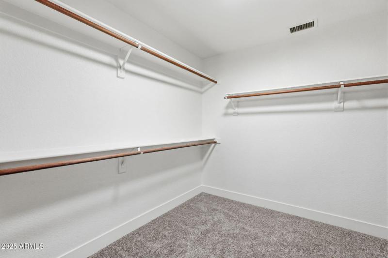 Primary Suite Walkin Closet