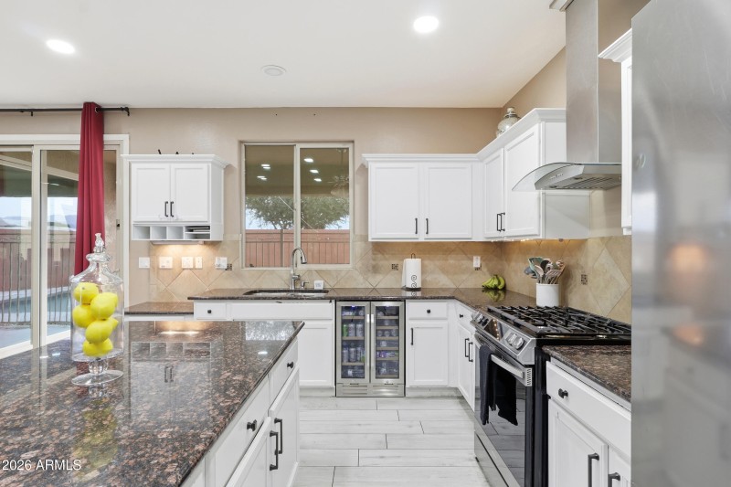 granite counters and beverage fridge