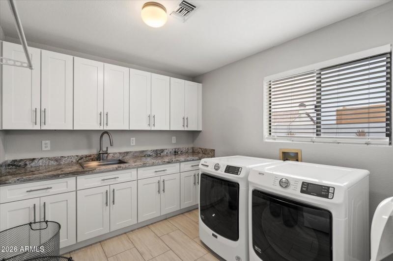 Massive Laundry Room with Utility Sink