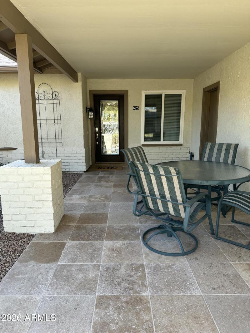 New travertine in front patio