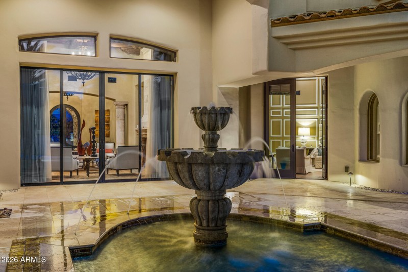 72primary wing backyard fountain_twiligh