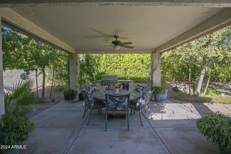 Ramada with tile roof to match the home
