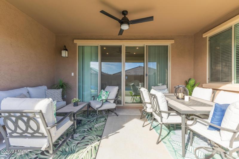 Covered patio with dining and lounge