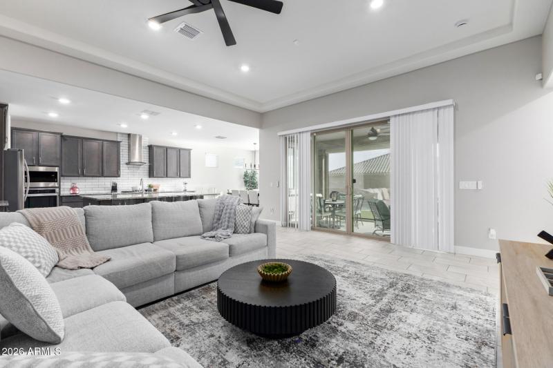 Open great room with ceiling fan