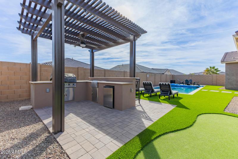 Outdoor kitchen with pergola