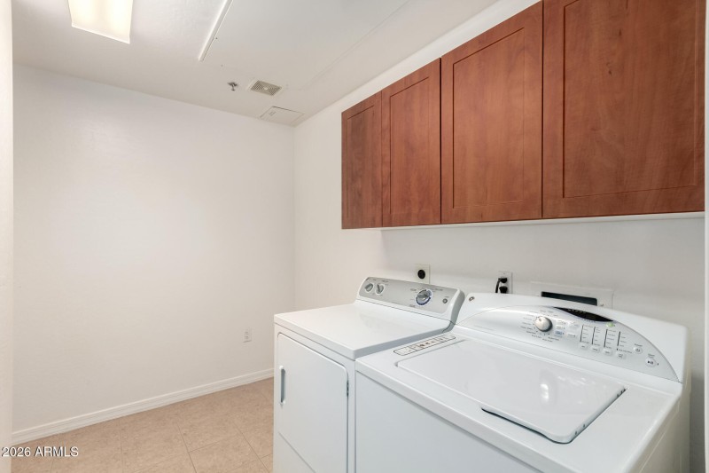 25-Laundry Room with storage space