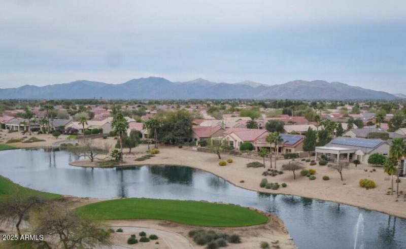 Golf Course with homes mountains