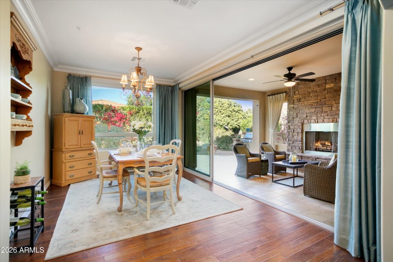 SLIDING GLASS WALL OPENS TO