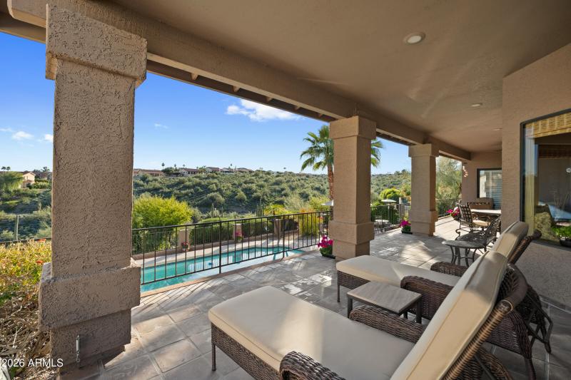 Patio overlooking pool & views