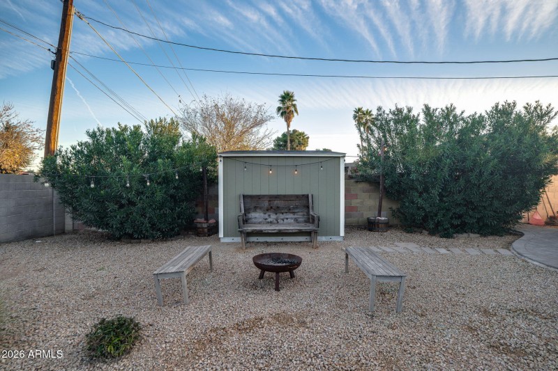 Backyard firepit and storage shed