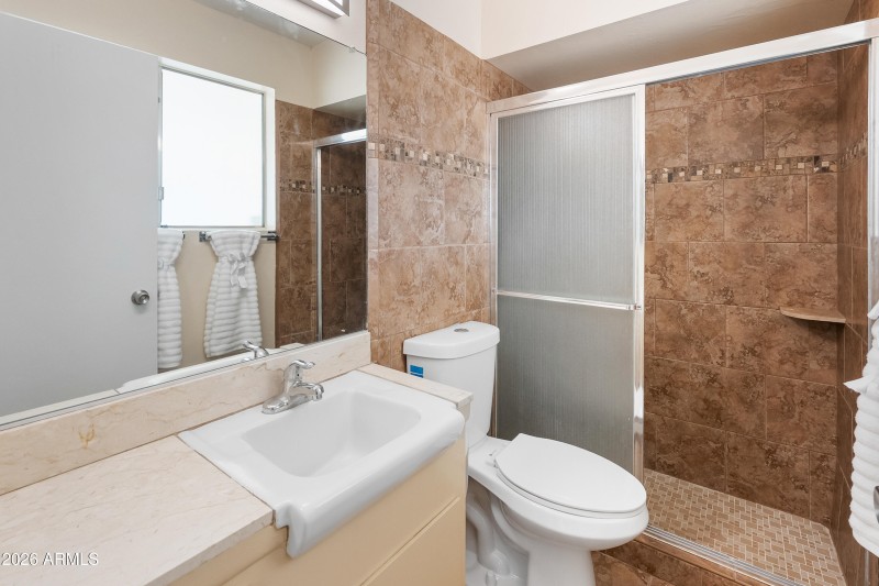 Primary Bathroom w pretty shower tile