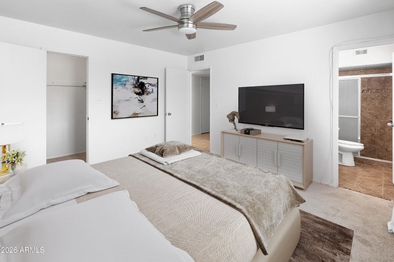 Primary bedroom and bathroom