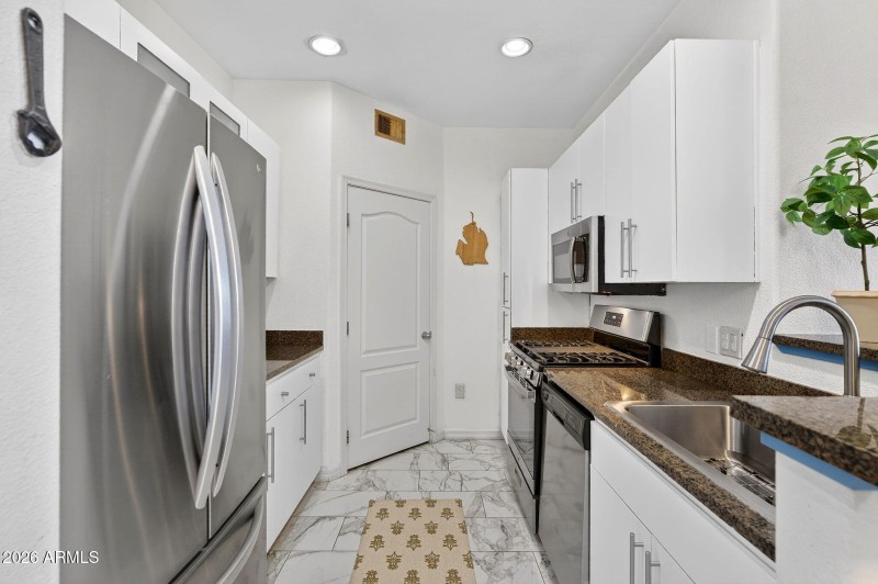 8-web-or-mls-09-E Princess Dr 2153