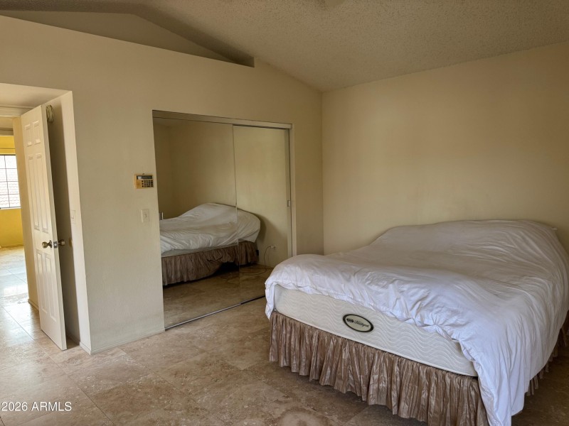 Mirrored walk-in Closet in Main Bedroom.
