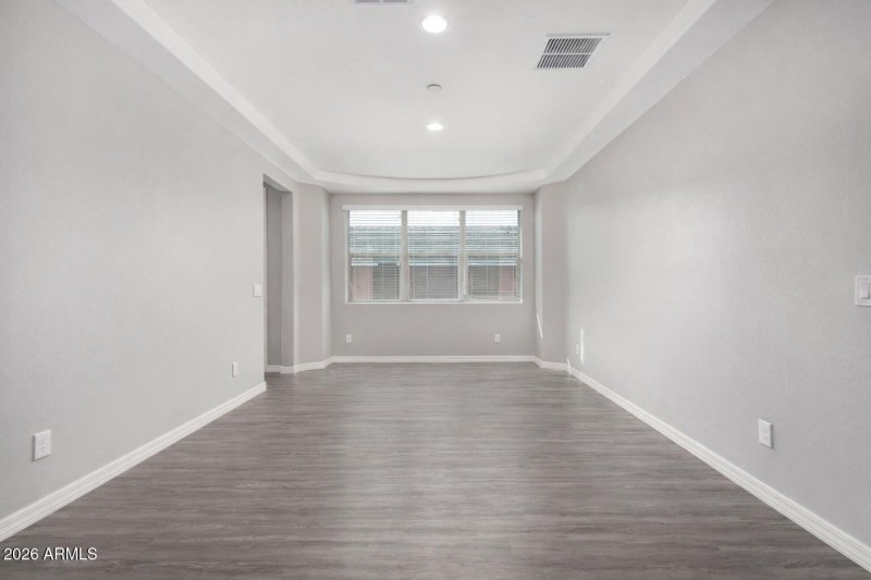 Spacious empty room with natural light