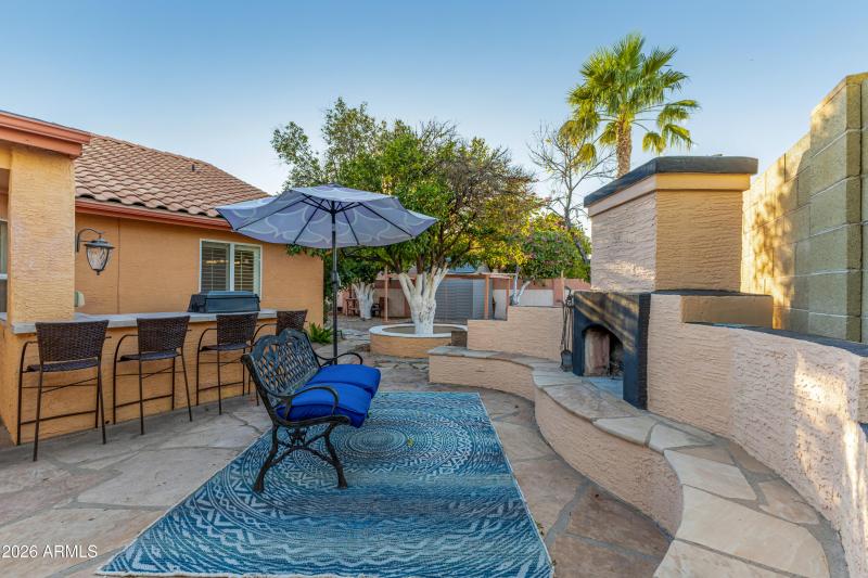 fb built in fireplace and bbq +bar