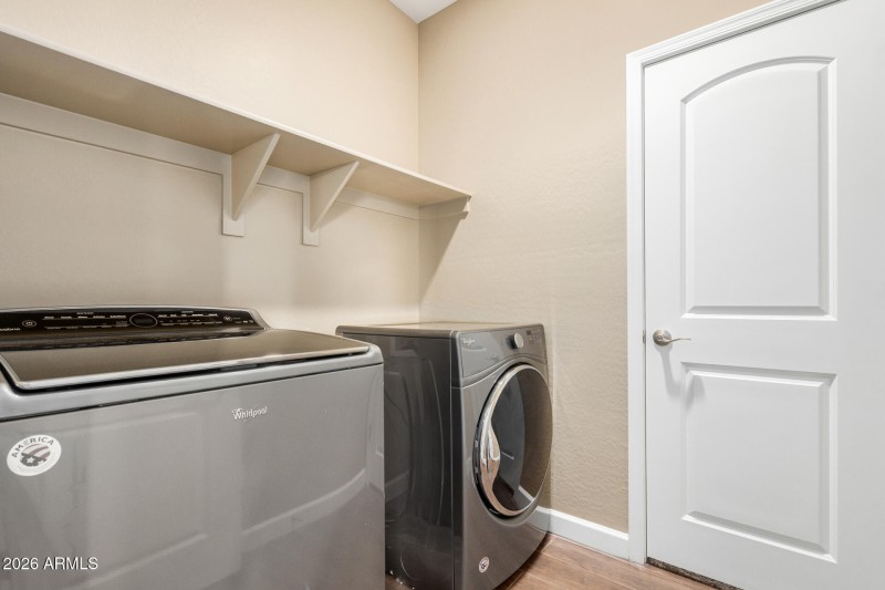Laundry Room w/ Primary closet access