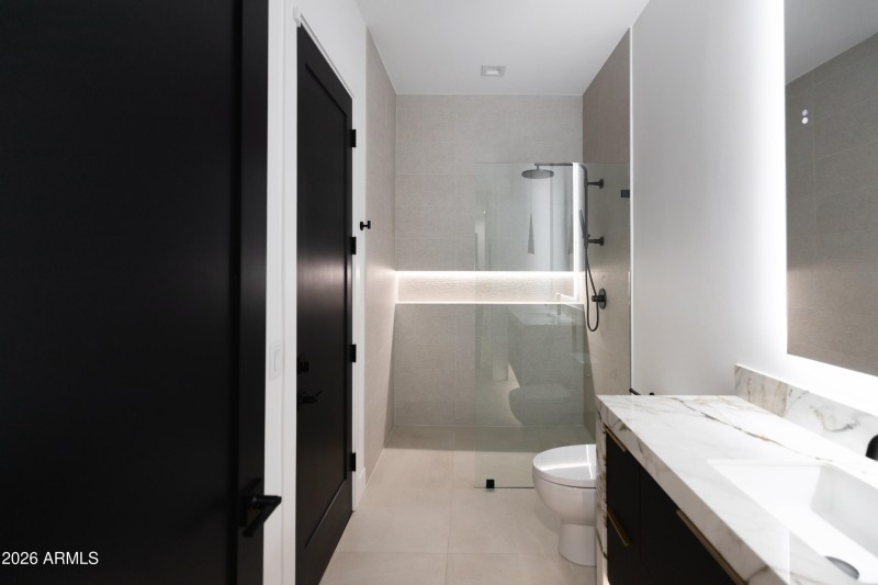 Downstairs Full Hall Bath w/Exit to Pool