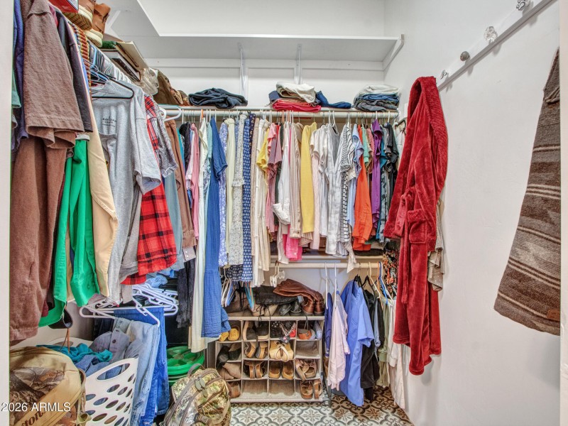 09-PrimaryWalk-inCloset