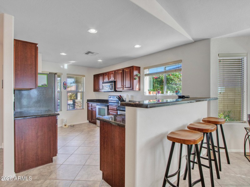 Open Kitchen With Bar Seating
