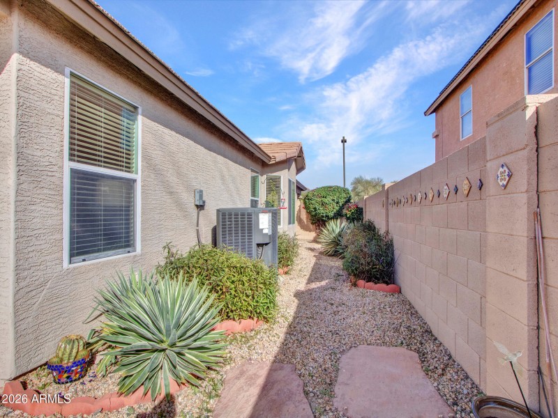 Side Yard With NEW AC Unit